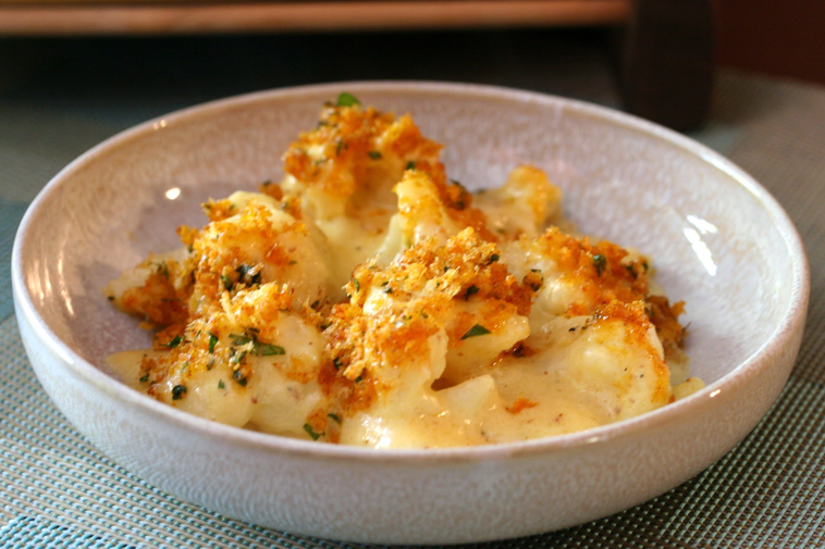 Cauliflower casserole with cheese and breadcrumb topping.