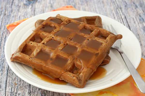 Chocolate waffles with syrup.