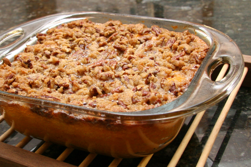baked sweet potato casserole with pecan topping