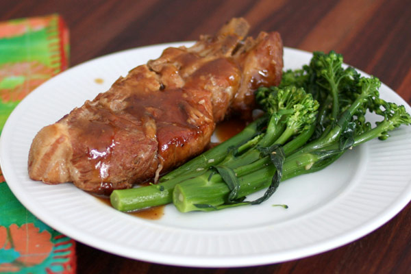Slow cooker maple country style ribs with broccoli on a plate.