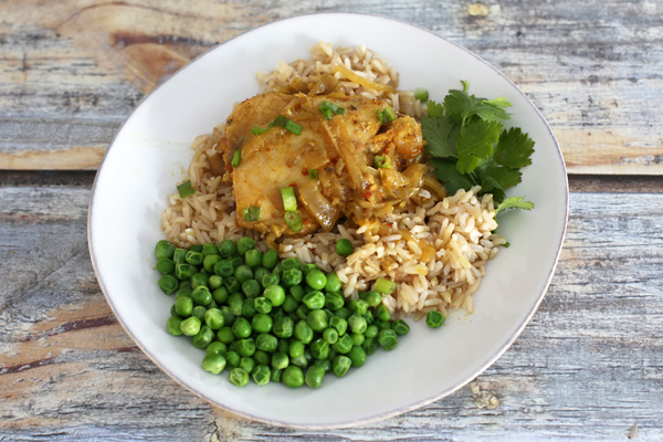 Slow cooker chicken curry with rice and peas.