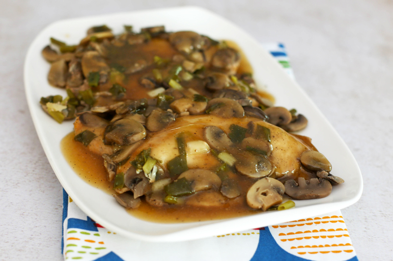 Chicken Marsala with mushrooms and scallions.