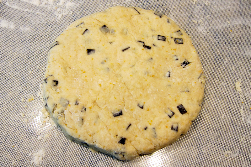 Making homemade scones with chocolate chunks.