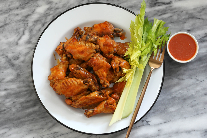 Instant pot chicken wings with hot sauce.