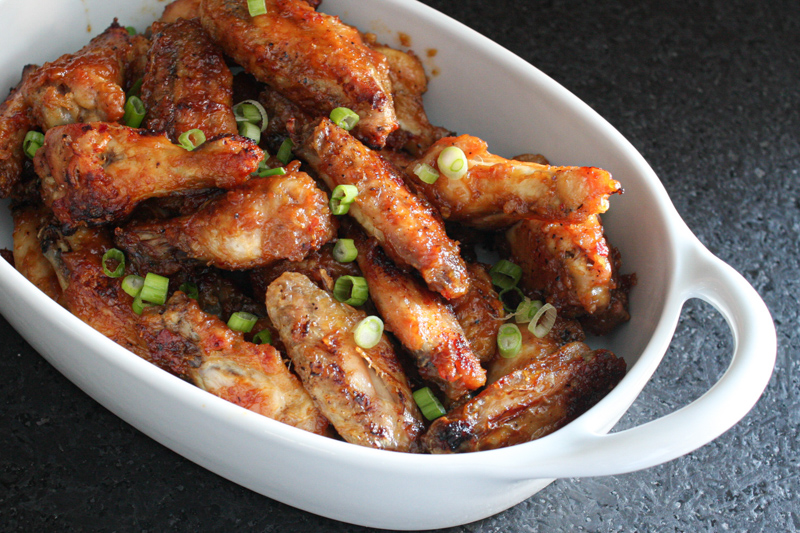 Chicken wings in a serving dish.