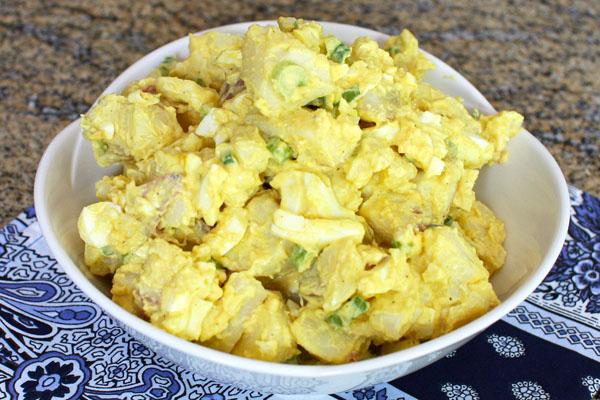 Potato salad with mayonnaise, eggs, and mustard.