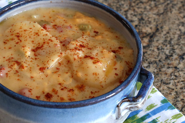 Scalloped potatoes in a bowl.