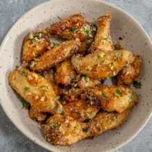 garlic parmesan wings in a bowl