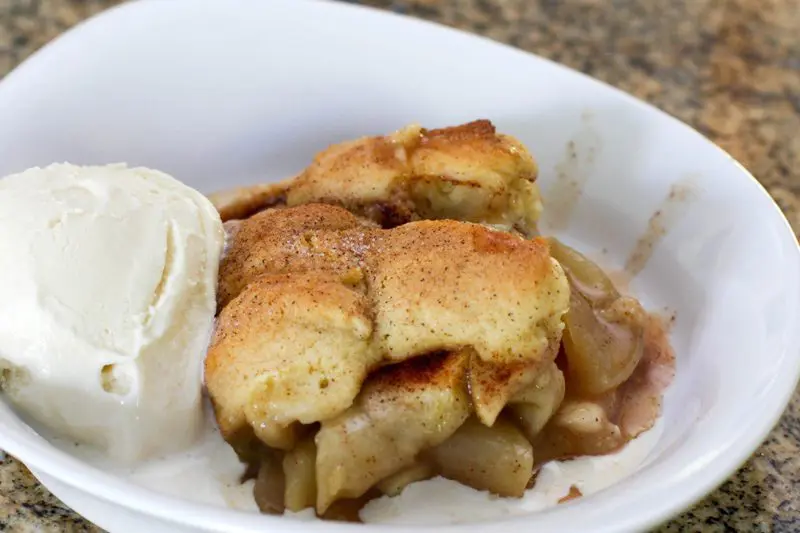 apple cobbler with a scoop of ice cream