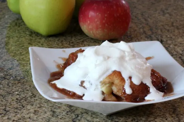 apple dumpling and whipped cream