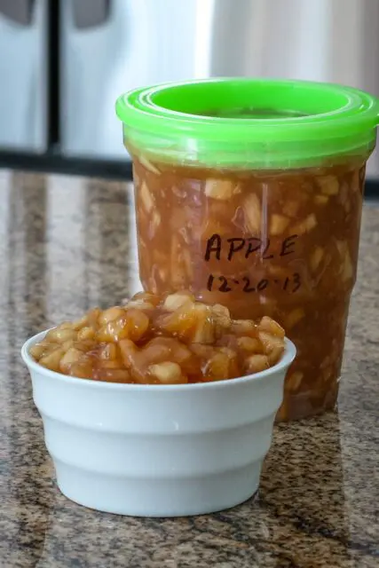 Apple dessert filling in a freezer container.