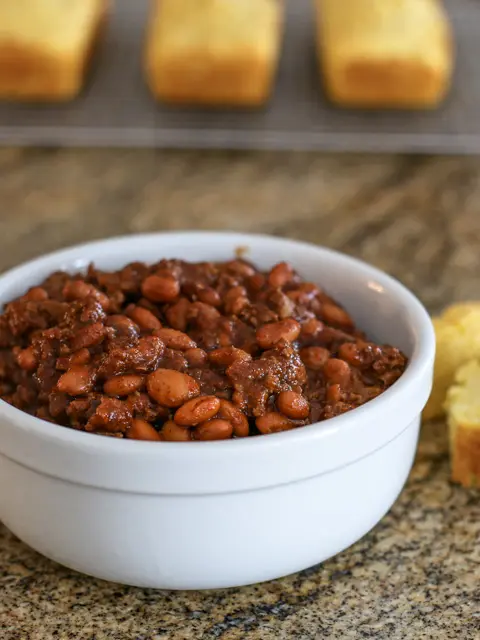 bowl of beef and beans with cornbread