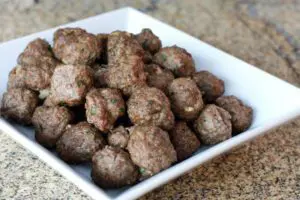 baked meatballs in a serving dish