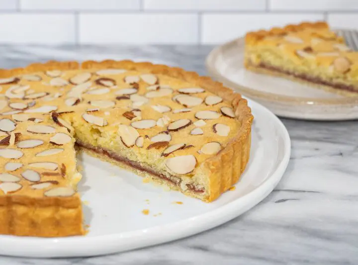 bakewell tart with a slice in the background