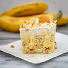 slice of banana poke cake