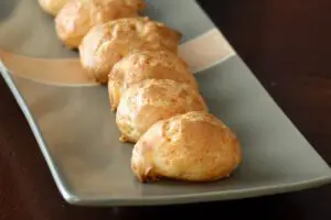 plate of freshly baked gougeres