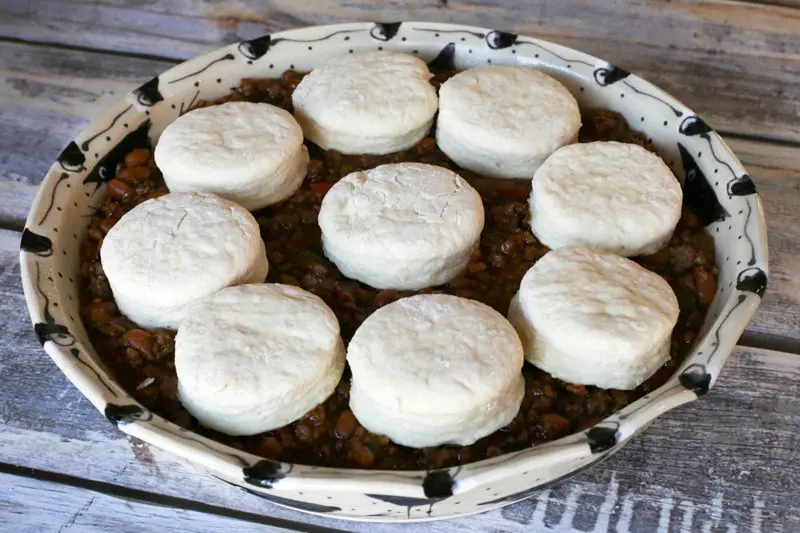 beef and bean casserole prep in a large pie plate