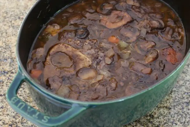 Braised beef shanks, cooked and ready to strain and make gravy.