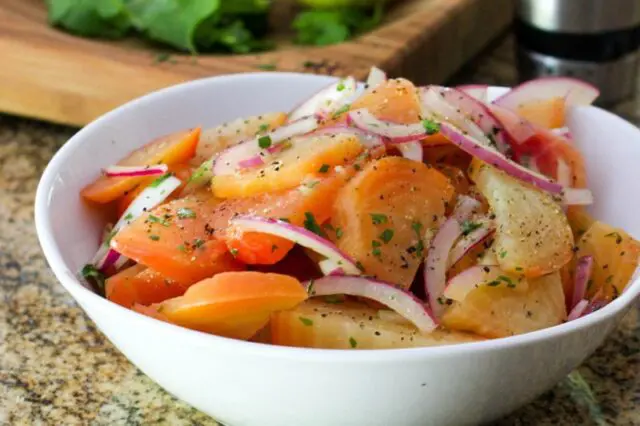 beet salad with a lemon vinaigrette in a serving bowl