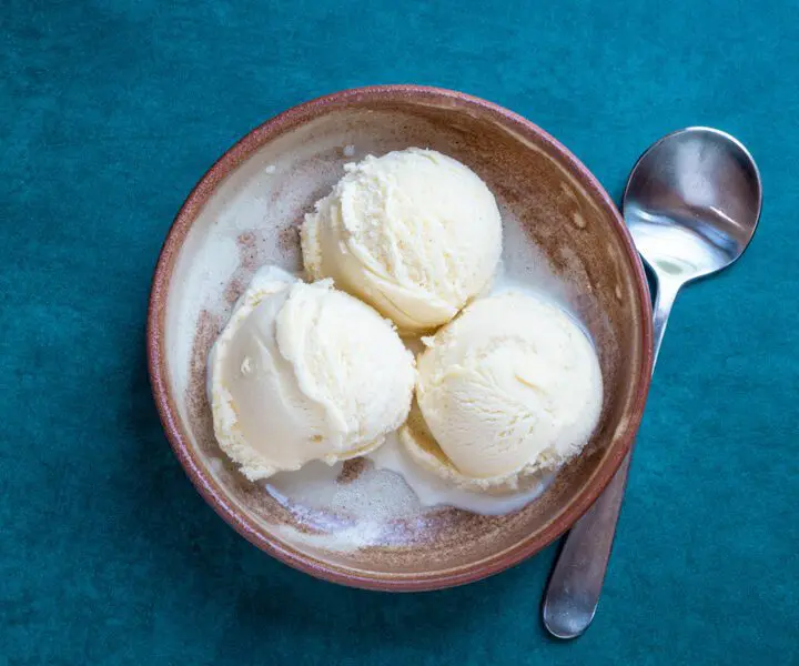 3 scoops of gelato in a bowl with a spoon