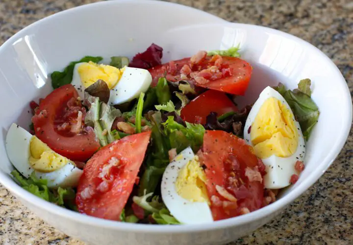 blt salad with hard boiled eggs in a serving bowl