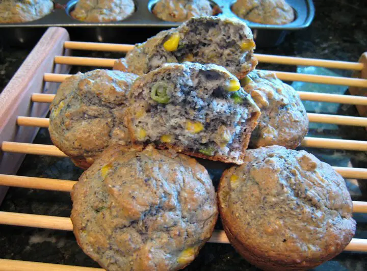 blue corn muffins on a rack