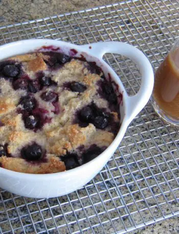 blueberry bread pudding in a baking dish