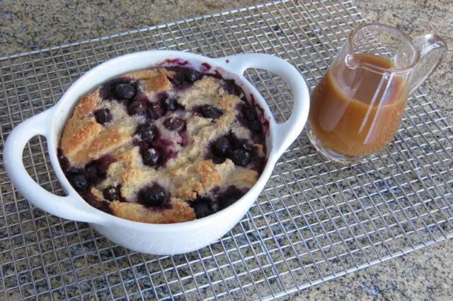 blueberry bread pudding in a baking dish