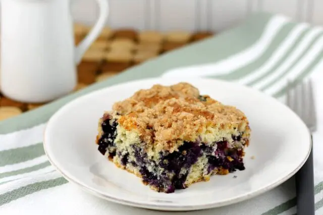 blueberry buckle coffee cake on a plate