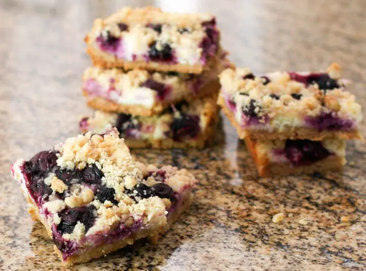 blueberry cheesecake bars stacked