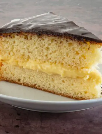 a slice of boston cream pie on a plate