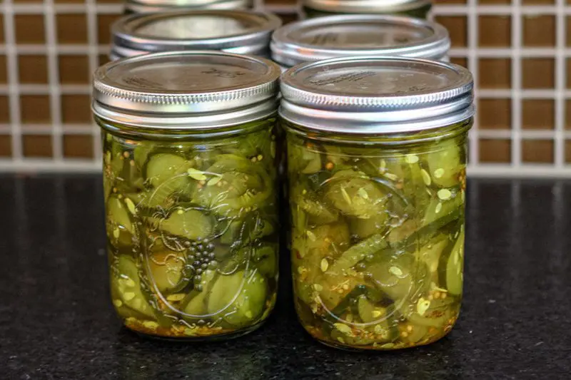 bread and butter pickles, homemade and home canned, in wide mouth 1-pint jars
