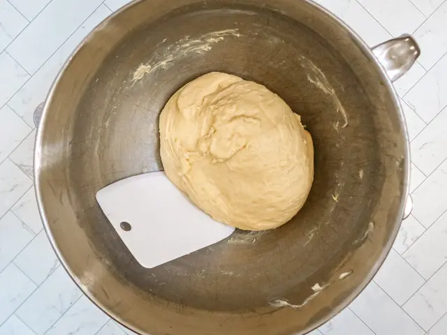 brioche dough with bowl scraper