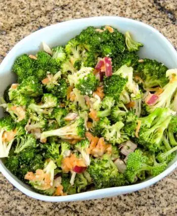 Broccoli salad with miso dressing and sesame seeds.