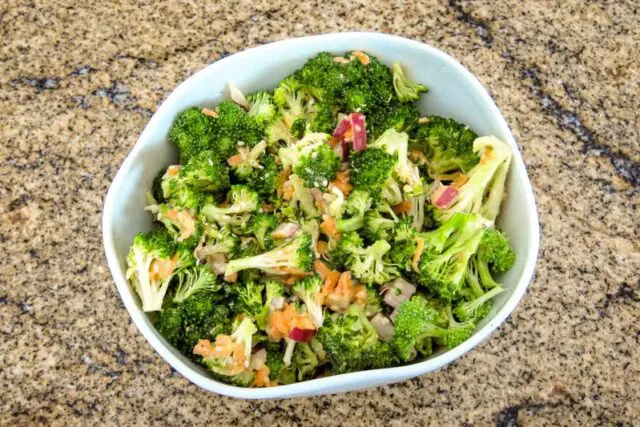 Broccoli salad with miso dressing and sesame seeds.