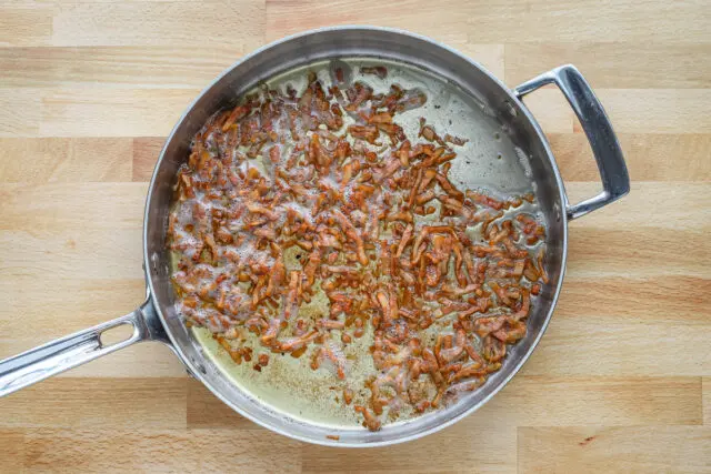 Guanciale is cooked until crisp then drained on paper towels.