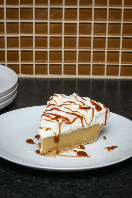 dessert plate with a slice of butterscotch pie