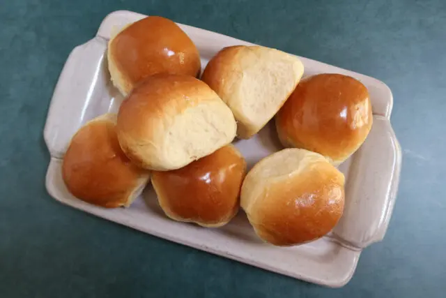 Dinner rolls on a serving tray