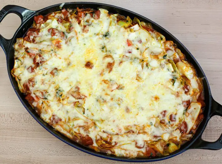 cabbage casserole with sausage in a staub baking dish