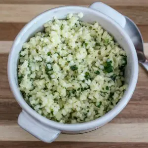 garlic and parmesan cauliflower rice in a bowl