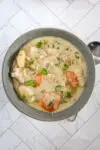 Chicken and dumpling soup with gnocchi dumplings, vegetables, and a creamy chicken broth.