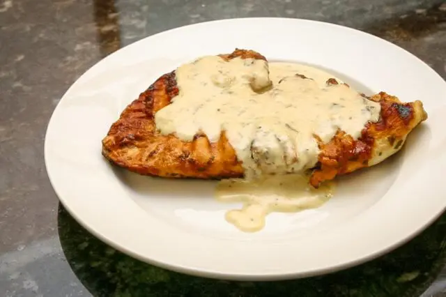 serving of chicken breasts with dijon mustard sauce