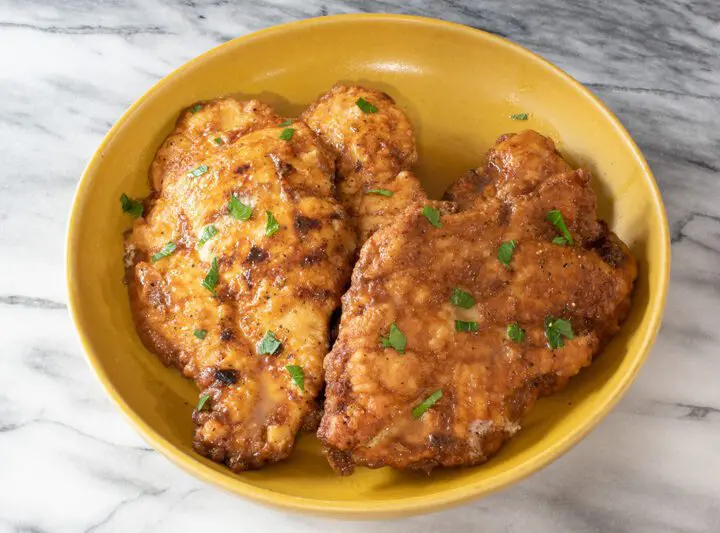 serving bowl with chicken francese