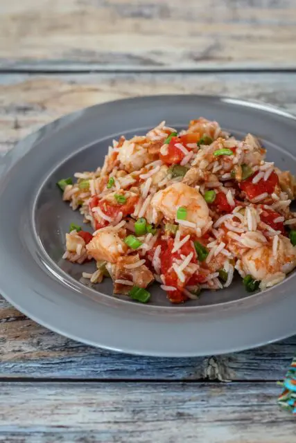 rice, shrimp, and chicken dish on a plate