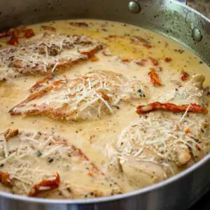 chicken breasts with sundried tomatoes in the skillet