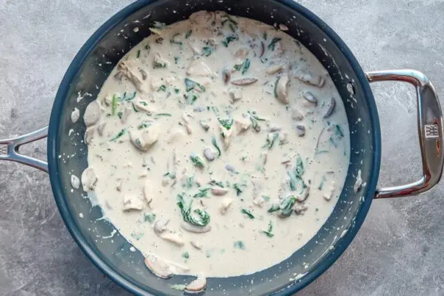 Add the chicken and sauce ingredients to the tetrazzini skillet