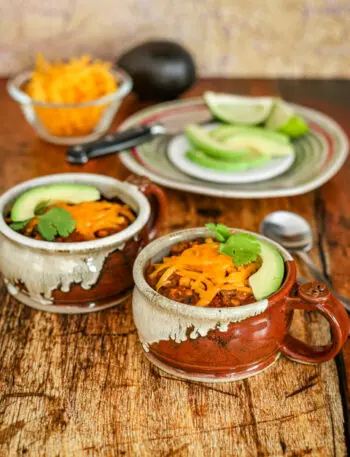 chili in cups with garnishes