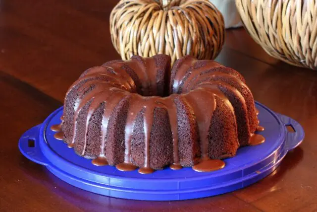 chocolate bundt cake on cake carrier tray