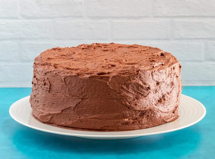 layer cake with chocolate buttercream frosting