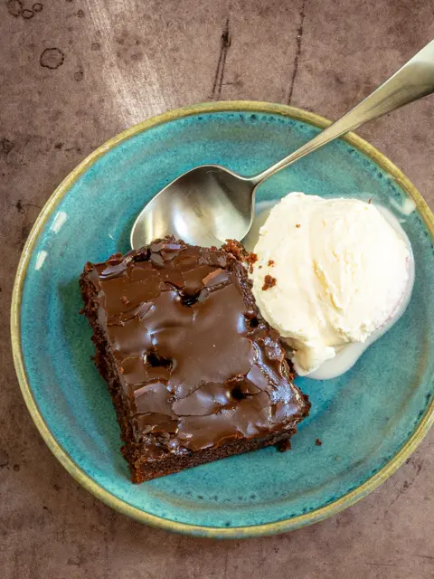 chocolate buttermilk cake with ice cream on the side